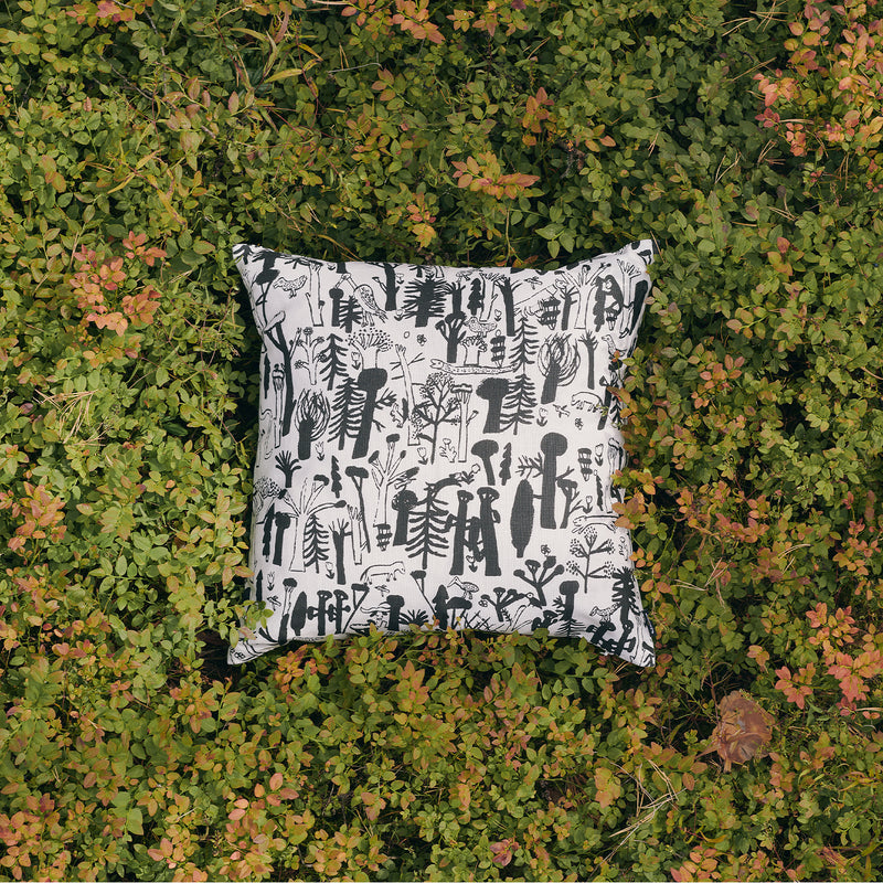 Kauniste Woodlands Cushion Cover laying in bushes
