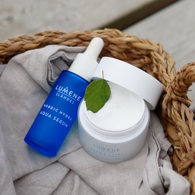 Lumene Serum and Moisturizer skincare combination laying in basket