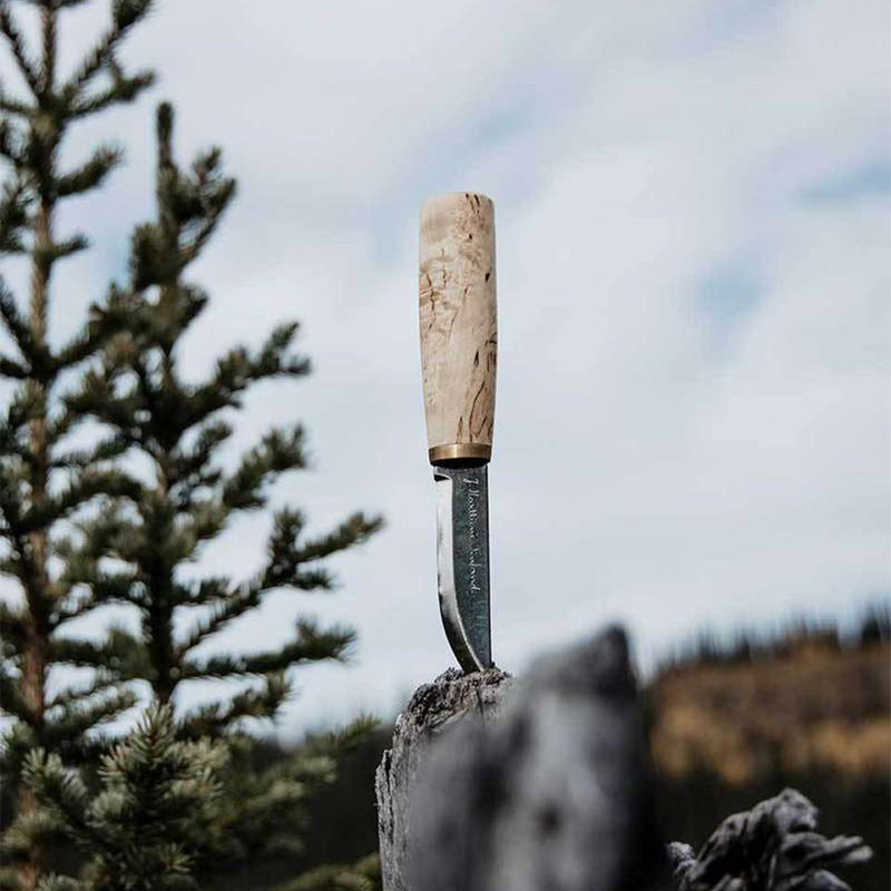 Marttiini Arctic Carving Knife stuck in fence post