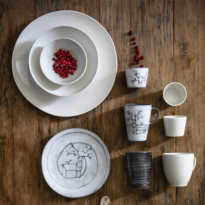 Grouping of mix and matched Pentik dinnerware