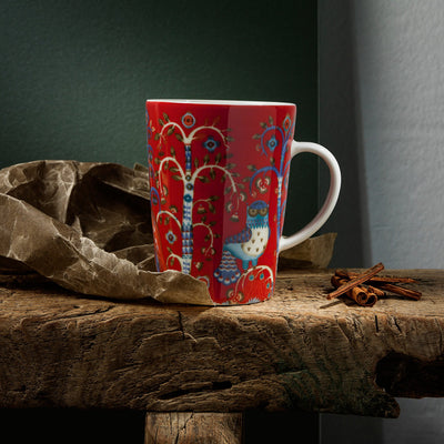 iittala Taika Red Mug on wooden bench