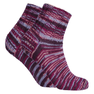 Pair of knitted socks made from Novita Nalle Taika Wool Yarn, wreath