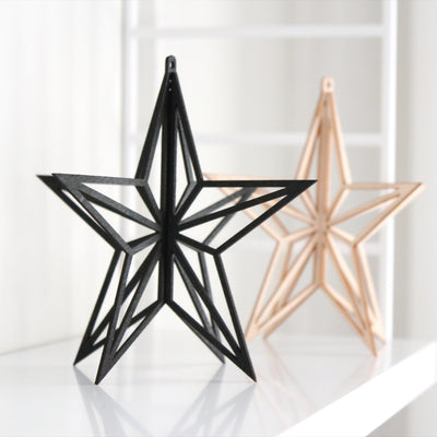 Two Valona Birch Star Crystal Decorations on shelf