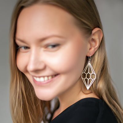 Woman with blonde hair modeling Valona Diamond Birch Earrings, Natural